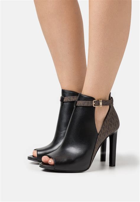 michael kors shoes womens boots|Michael Kors boots high heel.